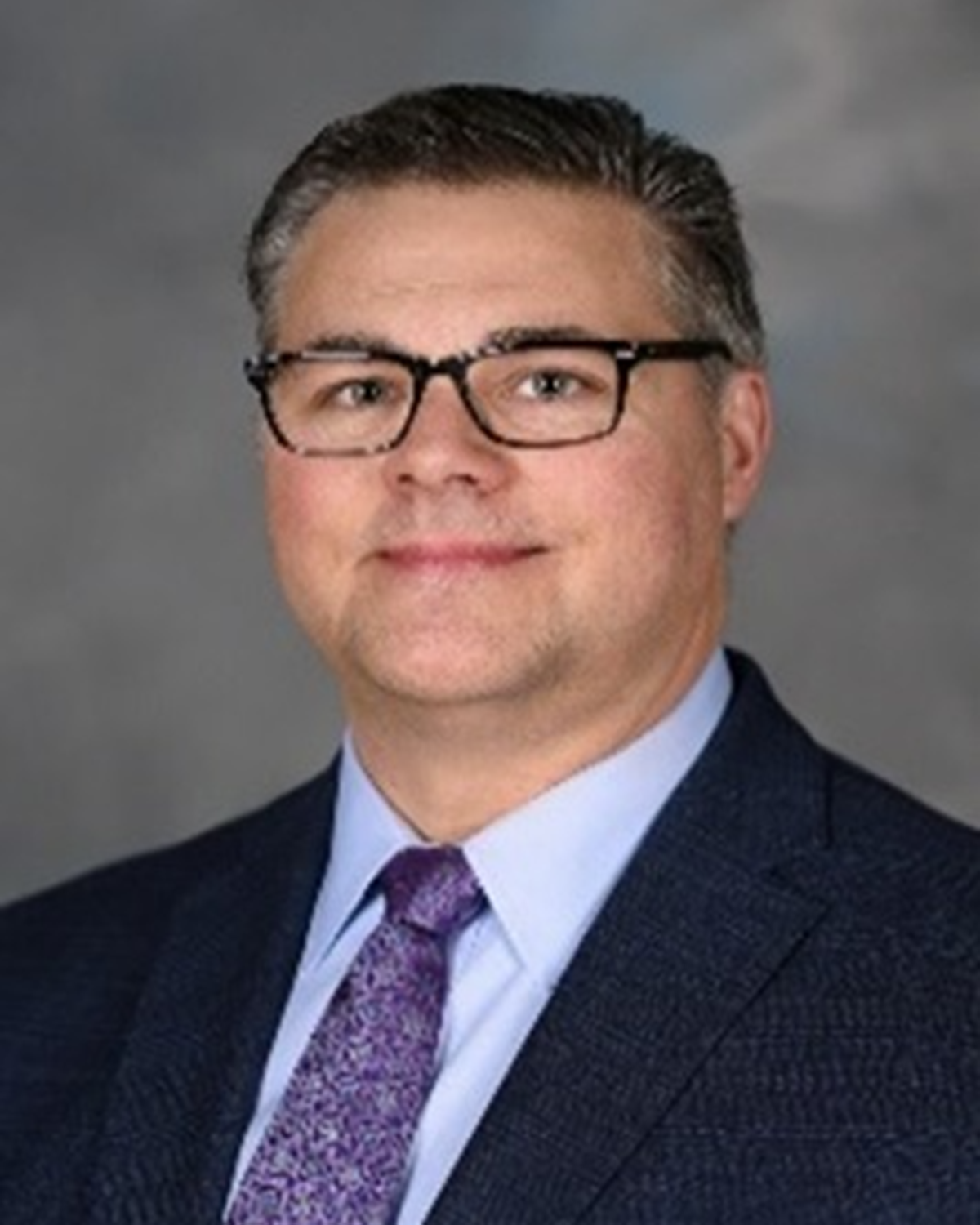 headshot of Mark A. Smith, New MSU Health Care CMO