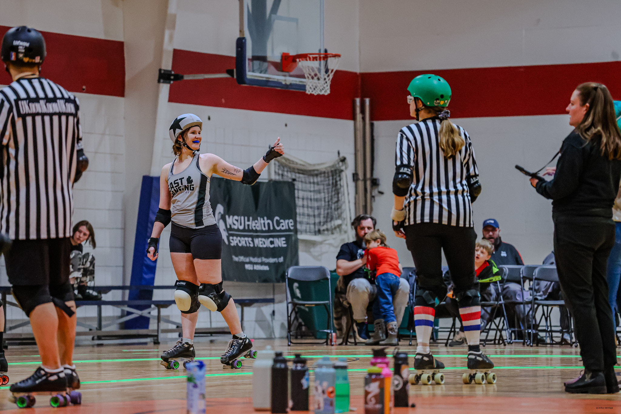 action during a lansing roller derby bout
