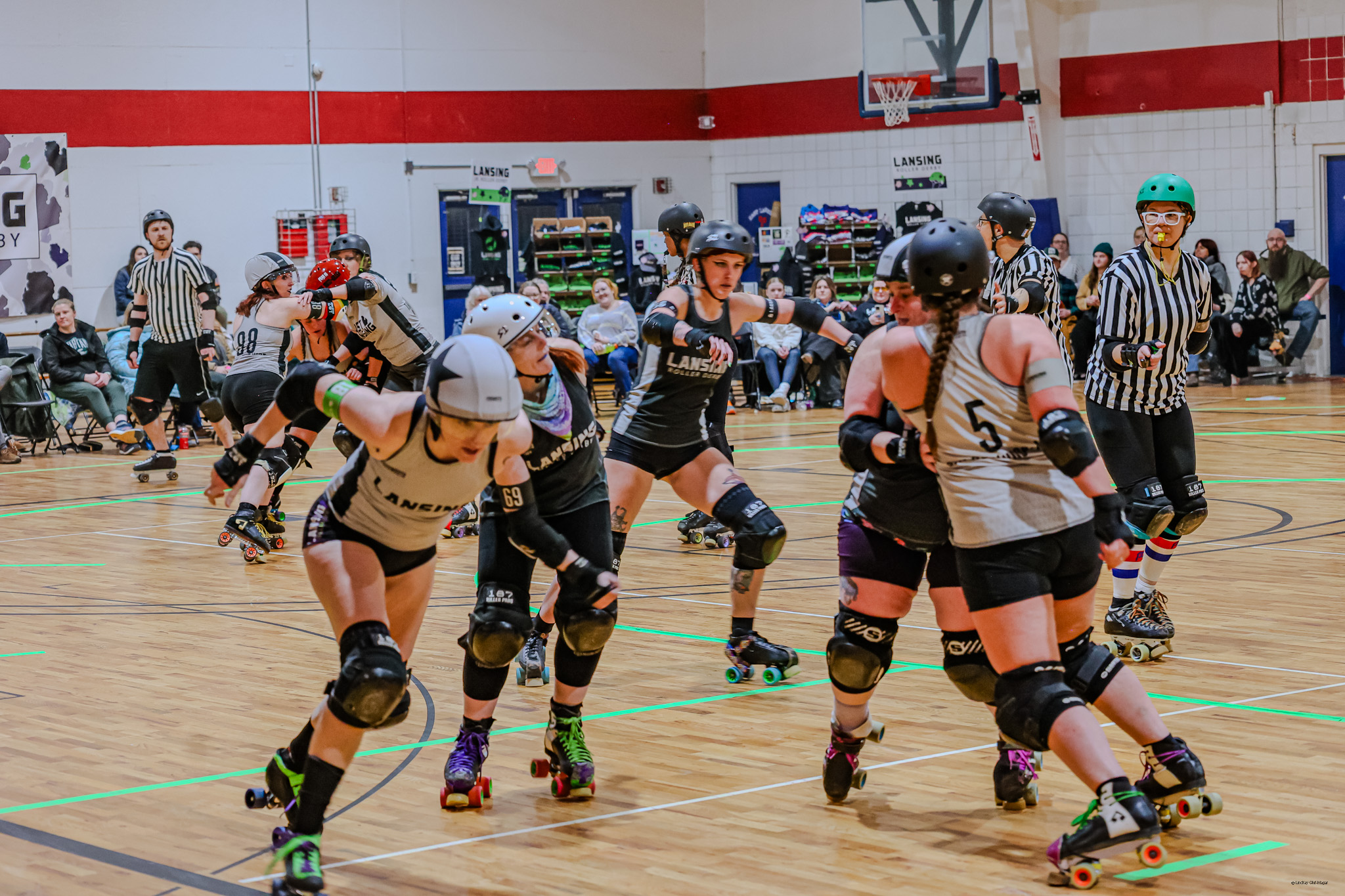 action during a lansing roller derby bout